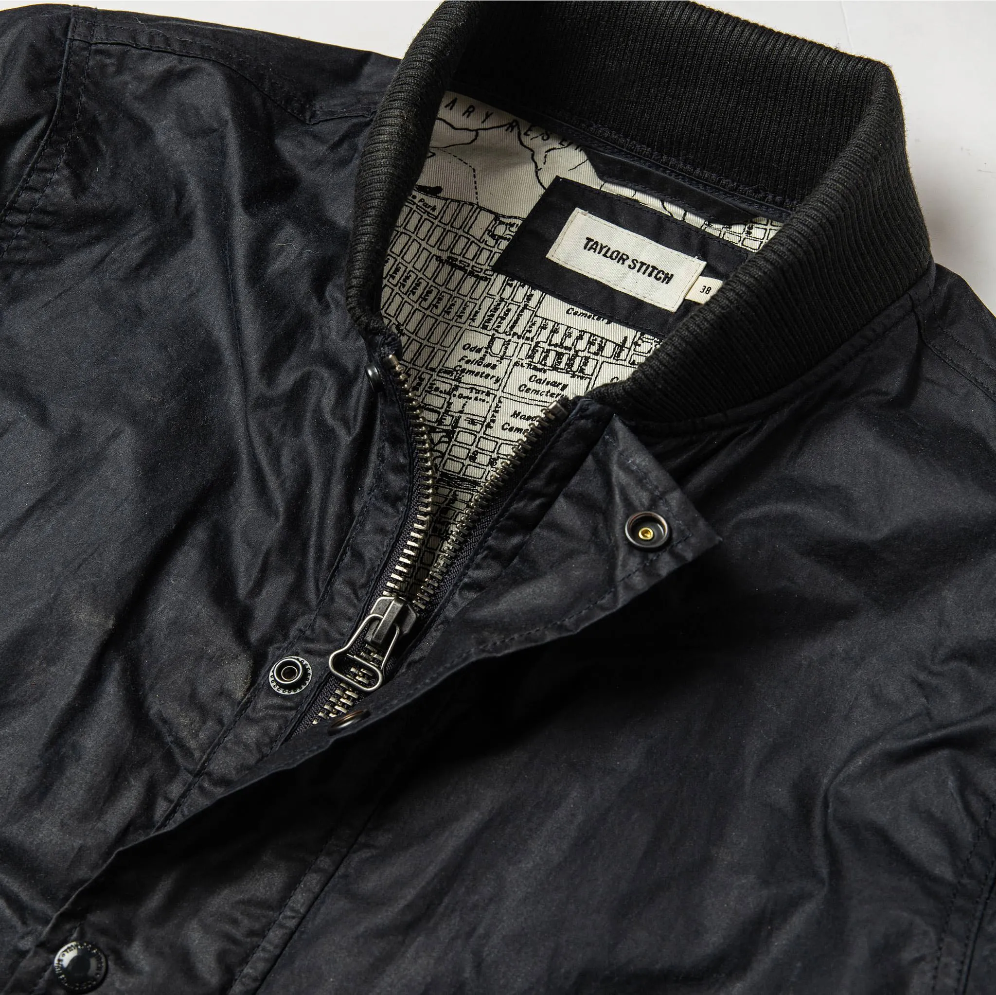 The Bomber Jacket in Waxed Navy